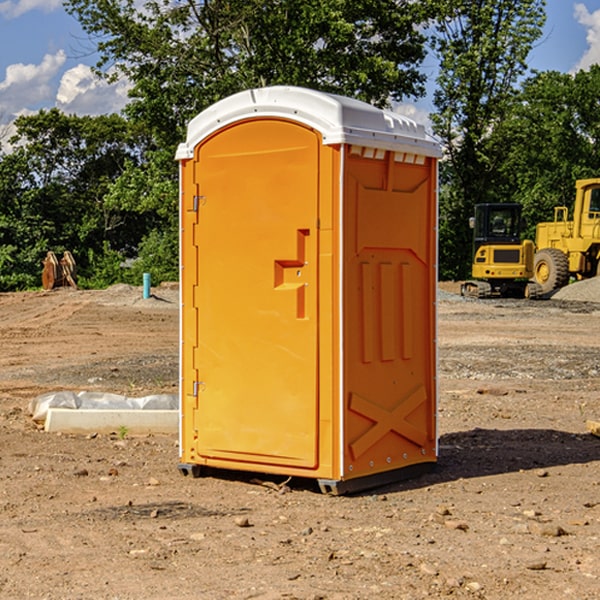 how often are the portable restrooms cleaned and serviced during a rental period in Myra WV